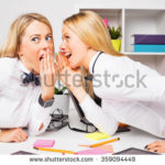 stock-photo-co-workers-sharing-a-secret-359094449